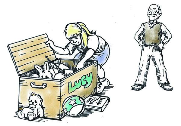 Lucy and Pop Pop at the toy chest